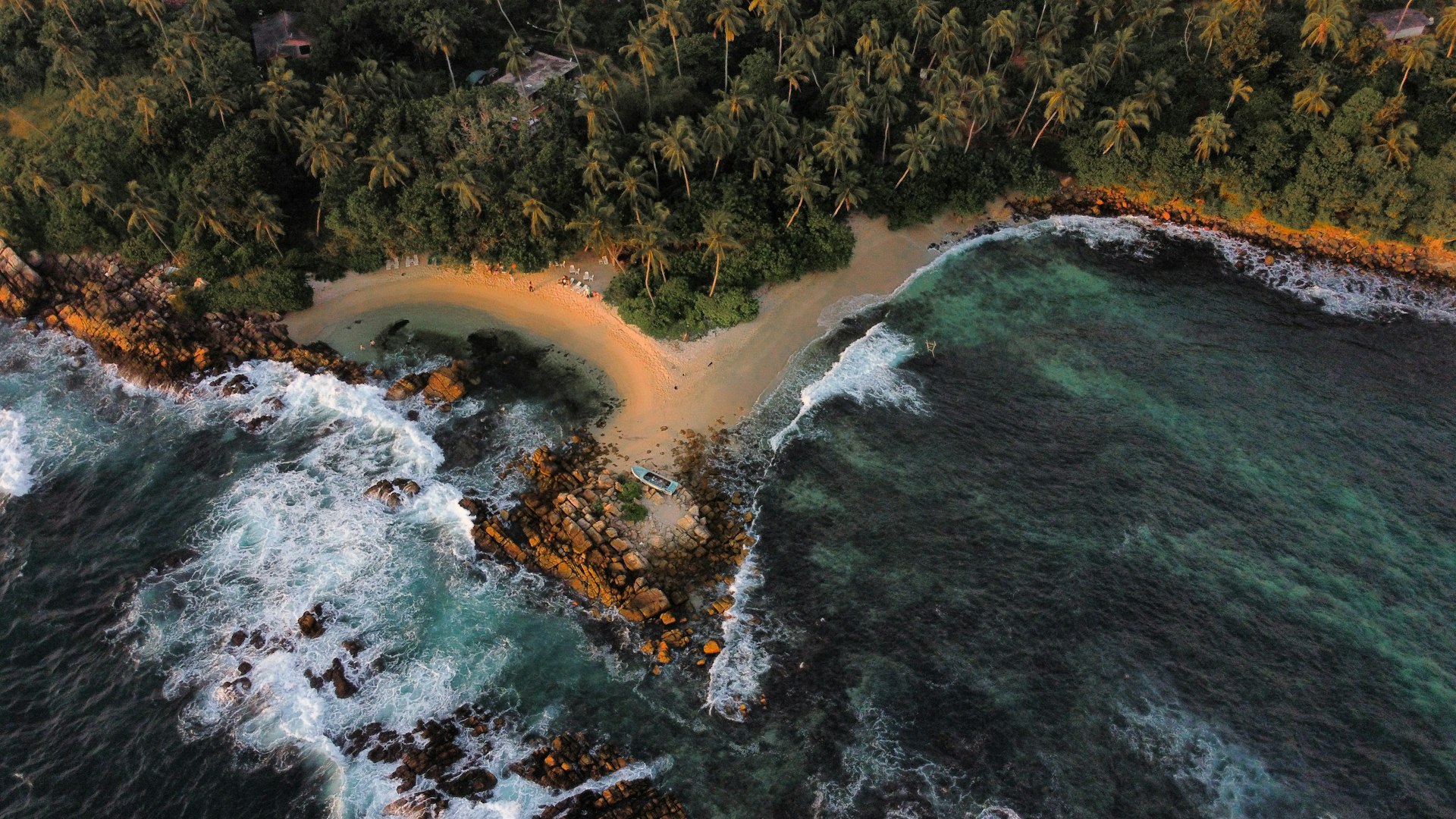 an aerial view of a beach and ocean